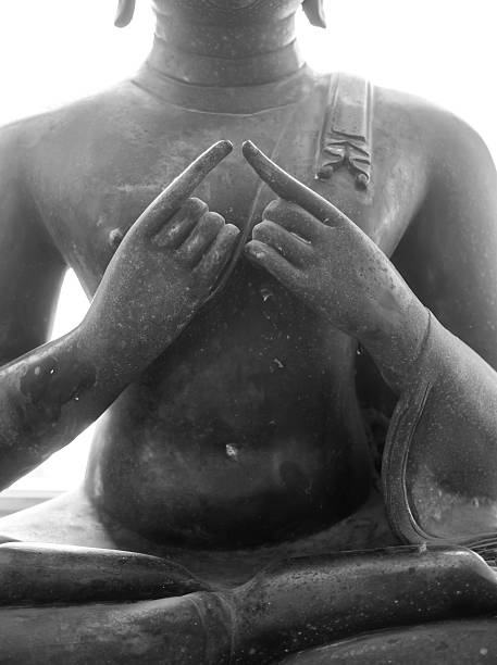 istock Hands of Buddha image in posture of meditation teaching 464676242