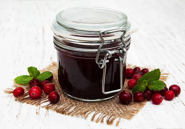 istock cranberry jam with fresh fruits 464676430