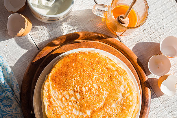 istock many subtle sweet pancakes with honey and sour cream 464676558