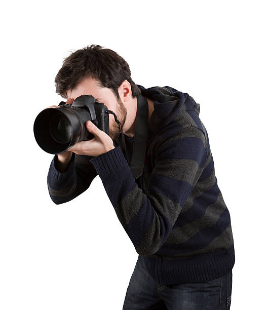 фотограф с камерой, изолированные на белом фоне - determination isolated on white vertical looking at camera стоковые фото и изображения
