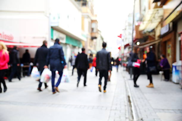 istock Young walking on street, motion blur 464679010