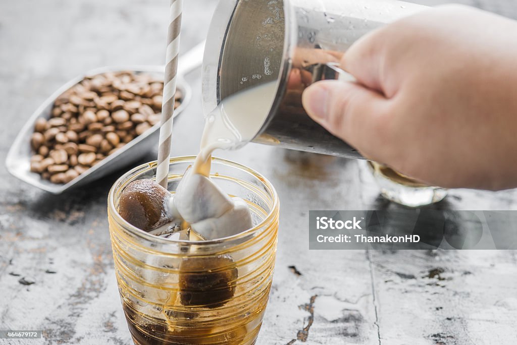 Arabica Iced Cafe Latte Iced coffee latte homemade making from ice cubes coffee frozen served with milk. 2015 Stock Photo
