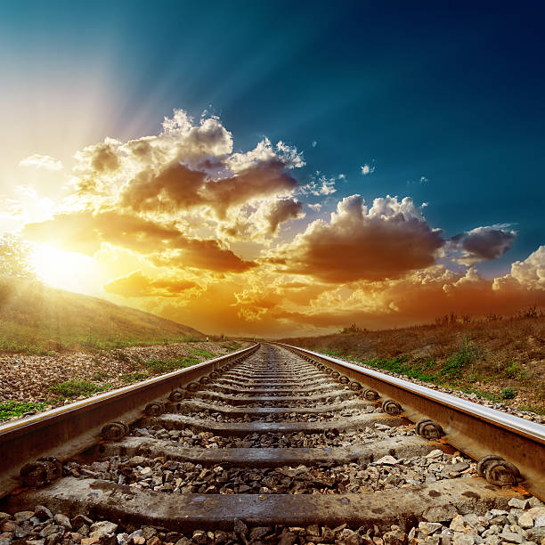 istock fantastic sunset over railroad to horizon 464679240