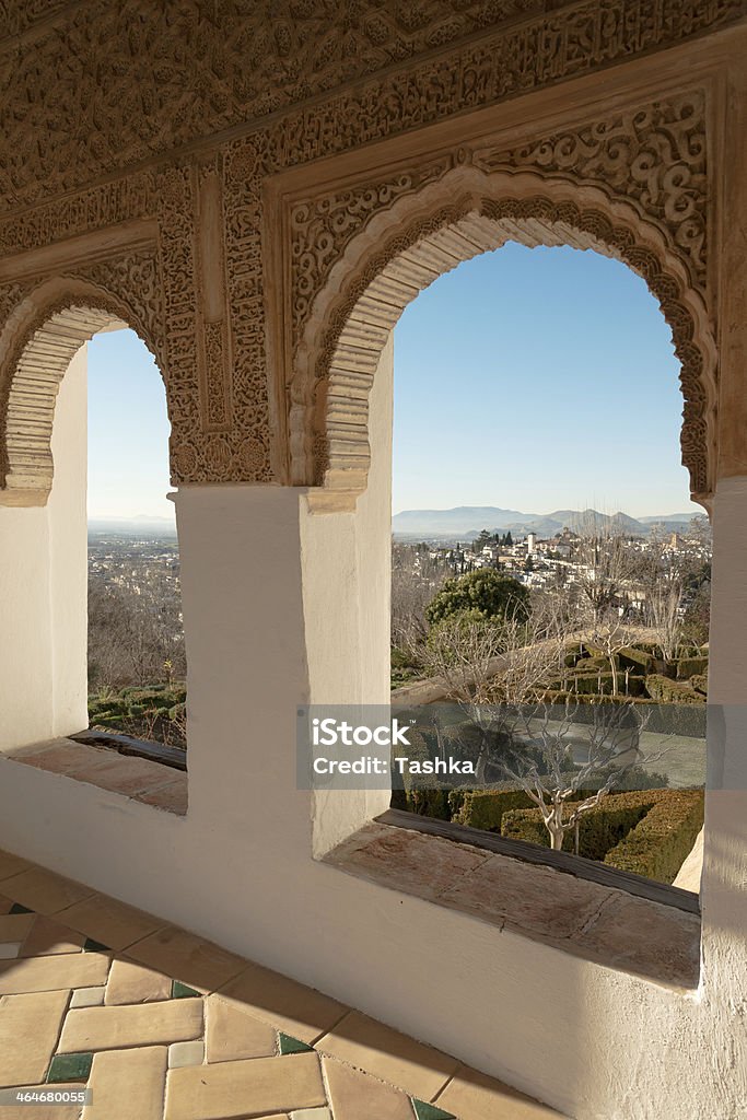 Alhambra arches Arches of Generalife palace in Alhambra with garden view, Granada Alhambra - Spain Stock Photo