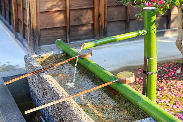 Traditional bamboo fountain in Kiyomizu-dera Temple, Kyoto, Japan