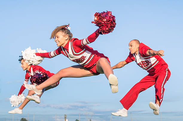 istock Cheerleaders team with male Coach 464686523