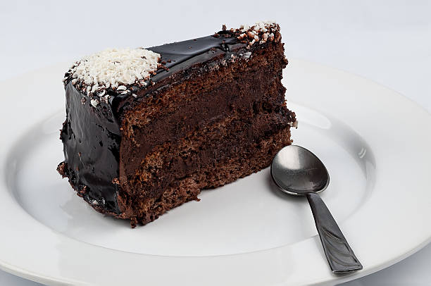 istock Slice of chocolate cake with chocolate glossy syrup topping 464688254