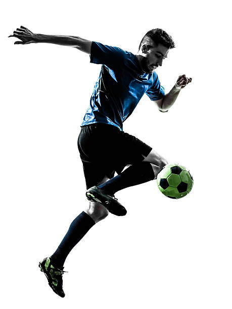 istock caucasian soccer player man juggling silhouette 464691368