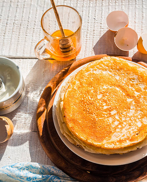 istock many subtle sweet pancakes with honey and sour, top view 464691544