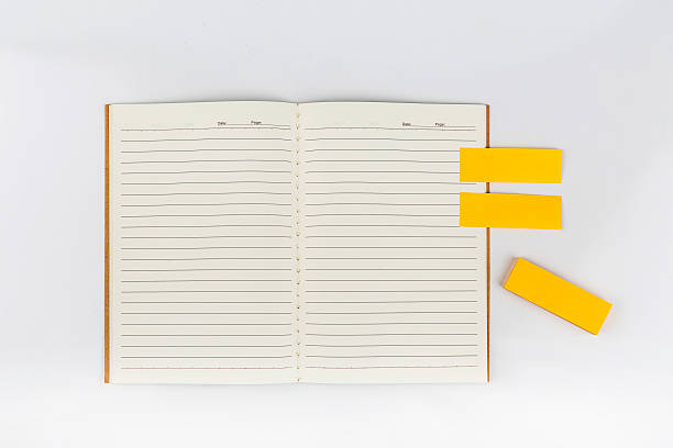 Open notebook with post it stock photo