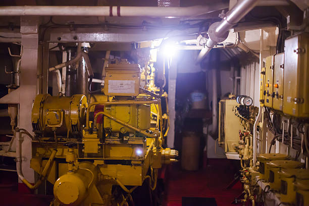 istock Engine room on a cargo boat ship with gears 464692286