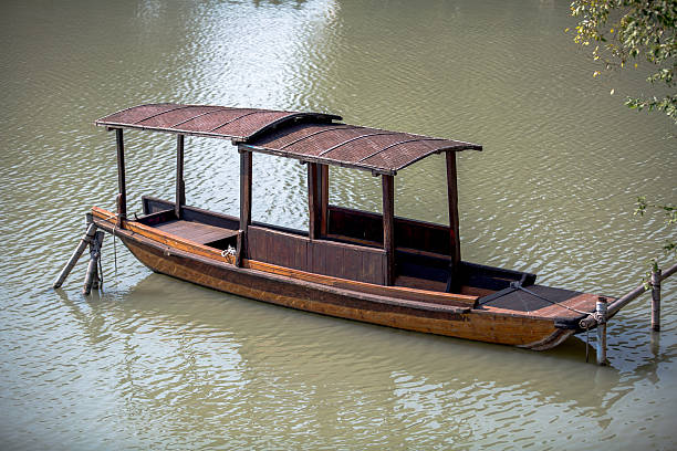 istock wooden boat on the water 464692326