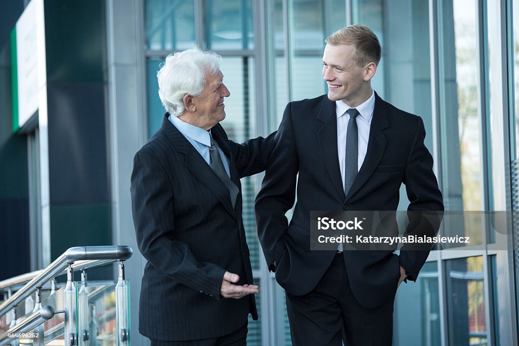 Happy office workers Happy office workers spending time out of the office Partnership - Teamwork Stock Photo