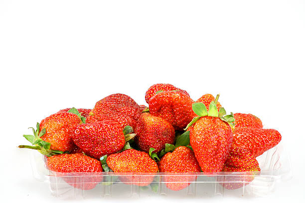 istock Strawberry Juice in clear plastic tray 464697132
