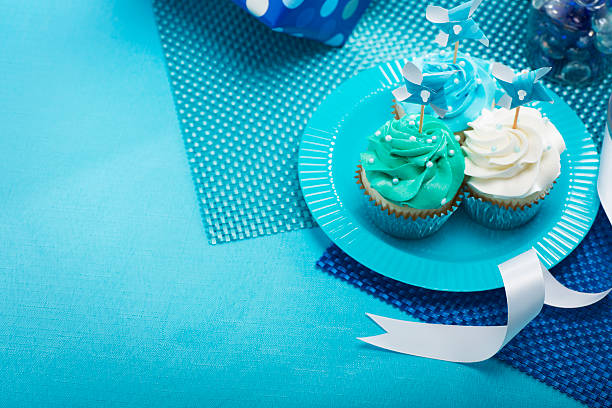 This is a close up photo of cupcakes for a little boys first birthday party.