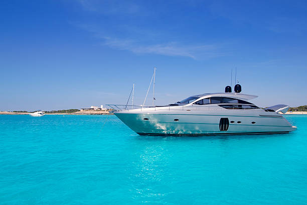 istock yatch in turquoise beach of Formentera 464701264