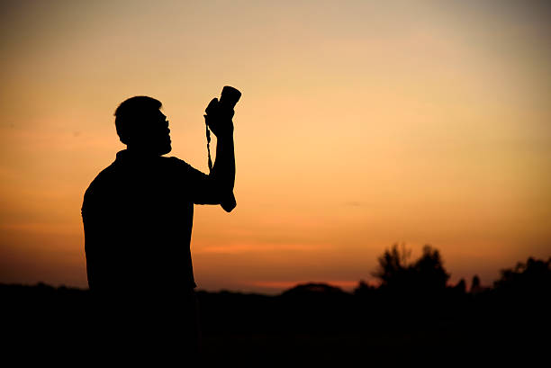 istock Silhouette of photographer 464702386