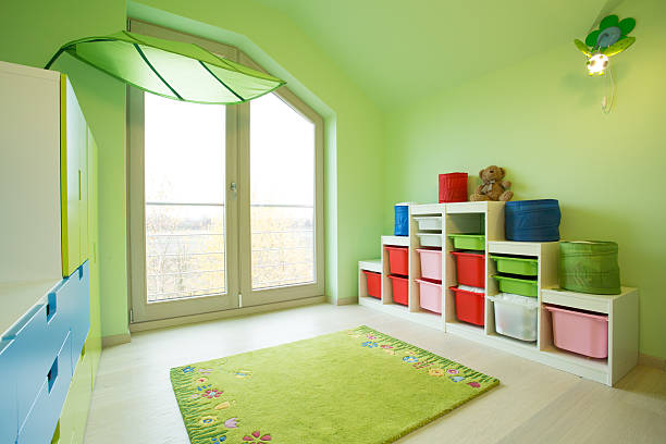 istock Children room with green walls 464705894