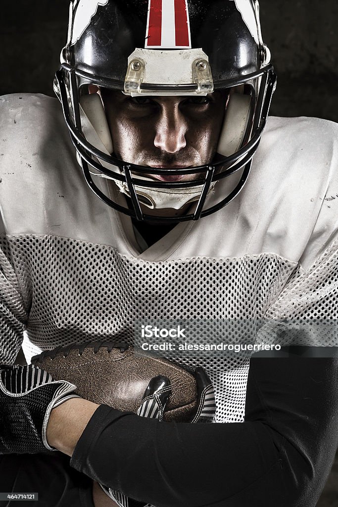 Portrait of american football player holding a ball Activity Stock Photo