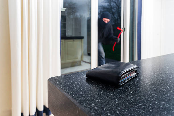 istock Burglar with a crowbar 464717655