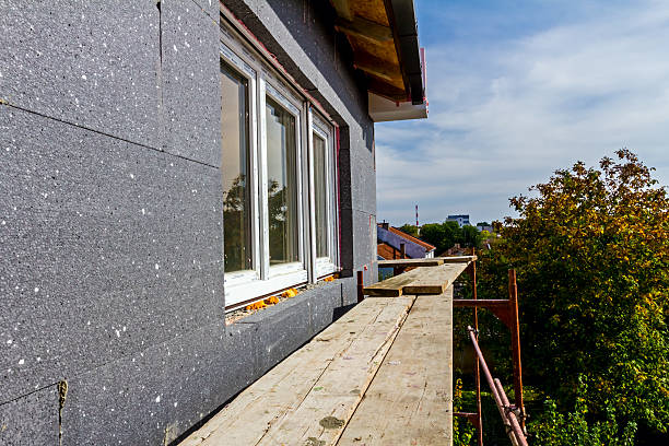 istock Several planks on scaffolds outside a house being built 464720318