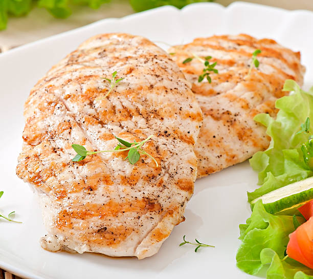 istock Grilled chicken breasts and vegetables 464720356