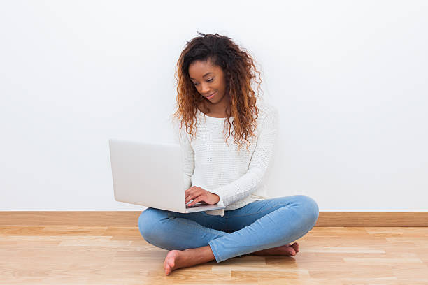 istock African American student girl using a laptop computer 464720400