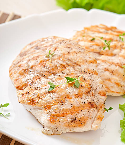 istock Grilled chicken breasts and vegetables 464721194