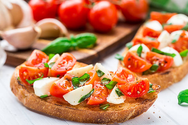 istock Bruschetta with cherry tomato and mozzarella 464721800