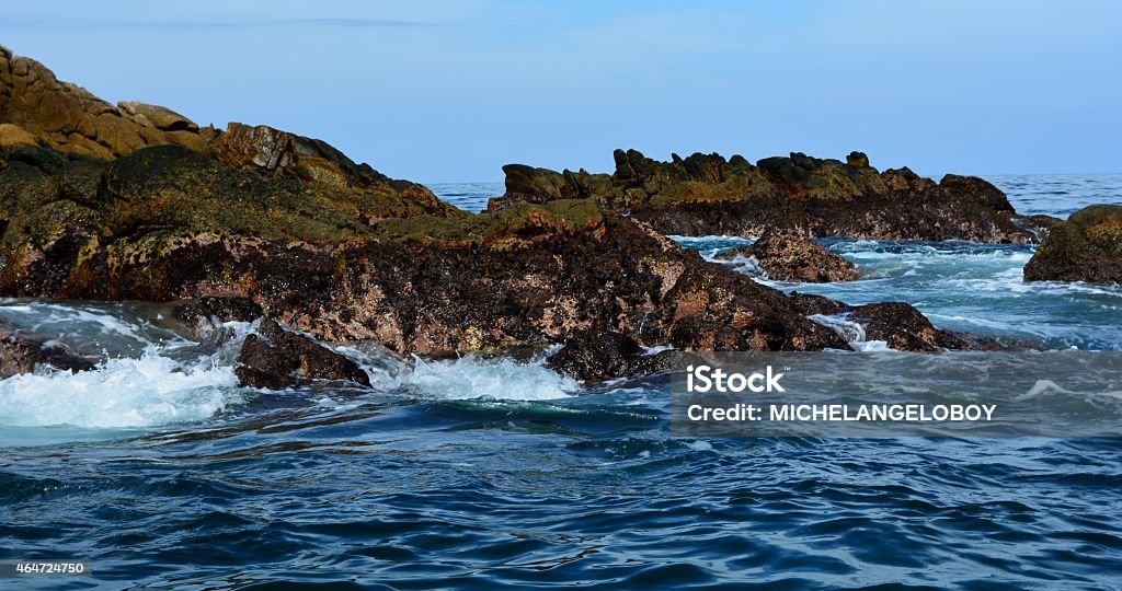 Estuary Estuary tide with rock and wave detail. 2015 Stock Photo