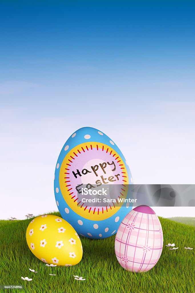 Decorated Easter eggs Decorated Easter eggs lying in the grass. 2015 Stock Photo