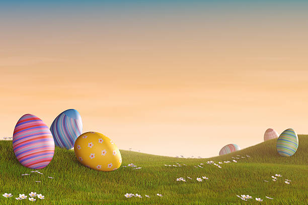 istock Decorated Easter eggs in a grassy hilly landscape at sunset 464724904