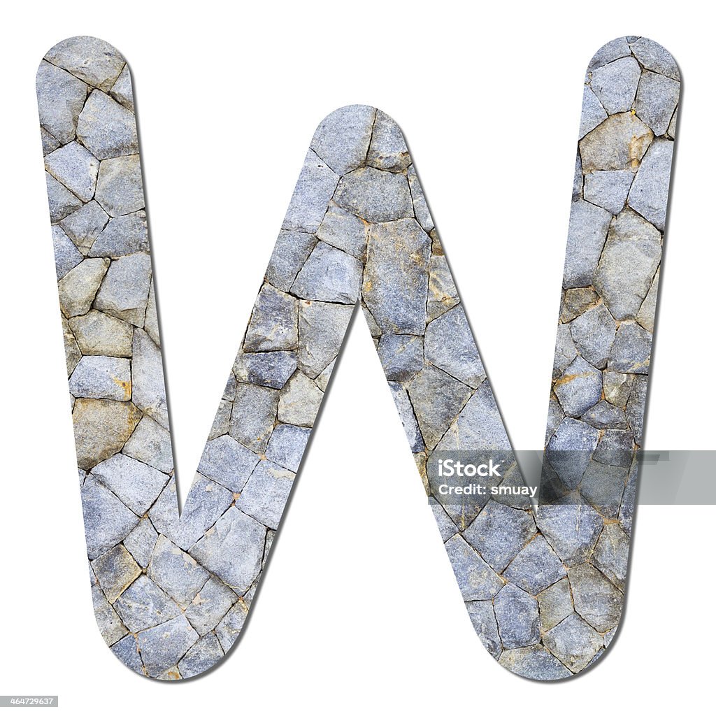 Font stone wall texture alphabet W Font from old and weathered stone wall texture alphabet W with shadow and path Alphabet Stock Photo