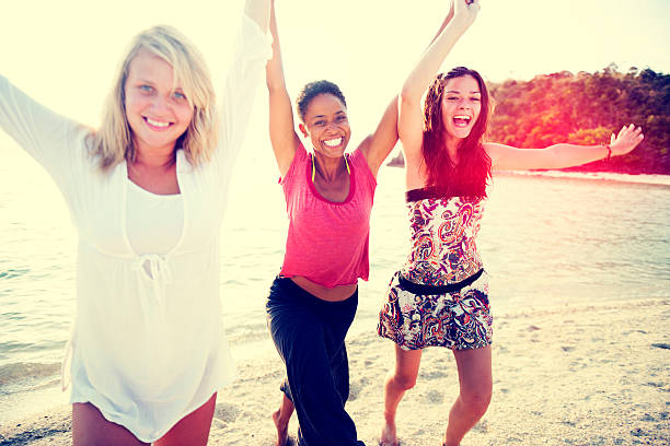 istock Women Fun Beach Girls Power Celebration Concept 464731978