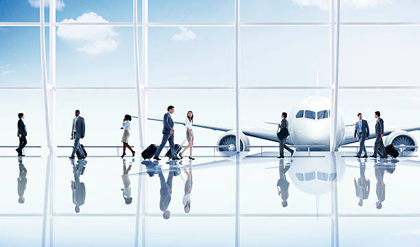 Group People Airport Business Travel Communication Concept ***NOTE TO INSPECTOR: This airplane is our own 3D generic design. It does not infringe on any copyrighted designs. business travel stock pictures, royalty-free photos & images