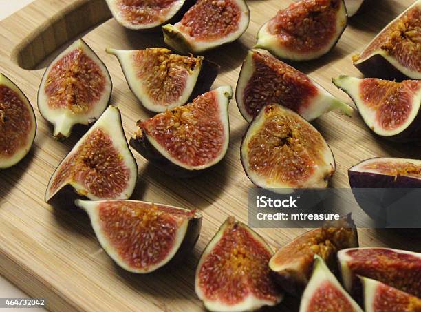 Image Of Sliced Fresh Figs On Wooden Breadboard Party Food Stock Photo - Download Image Now