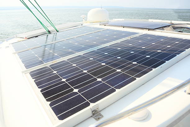 istock Solar Panels charging batteries aboard sail boat 464732605