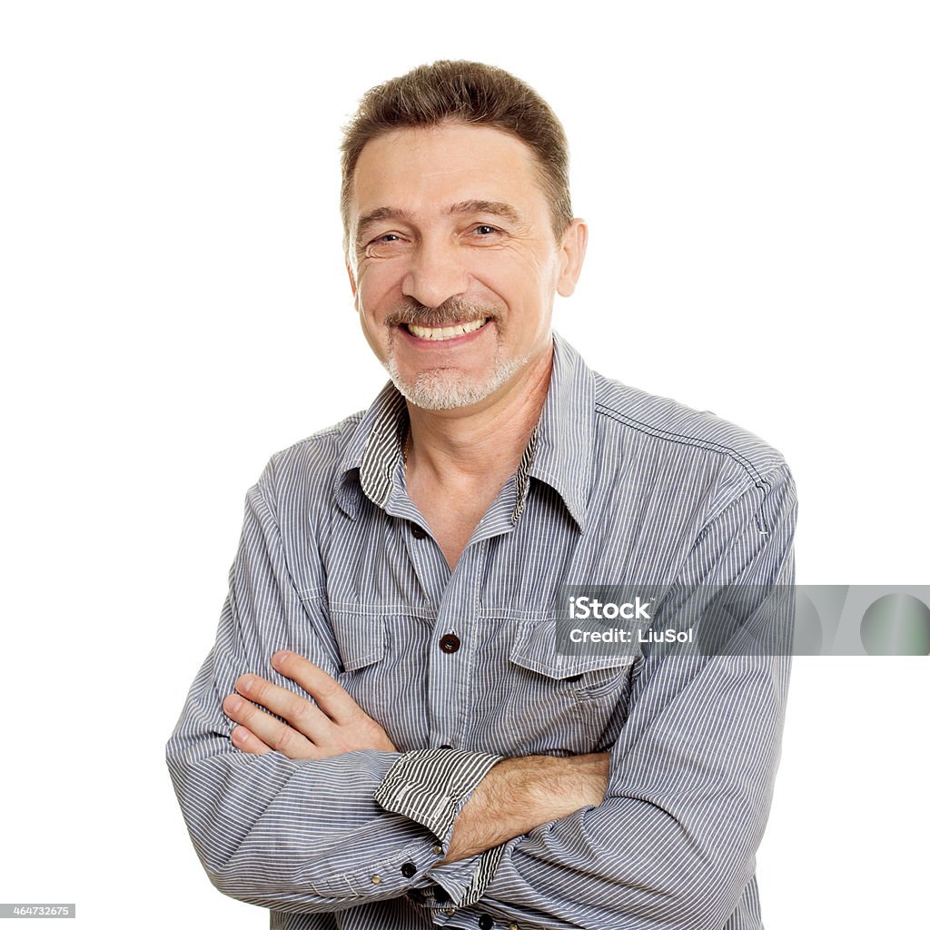 Smiling middle age man with grey shirt Midsection Stock Photo