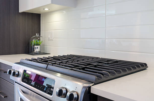 istock Fragment of a modern kitchen with a gas stove 464734200
