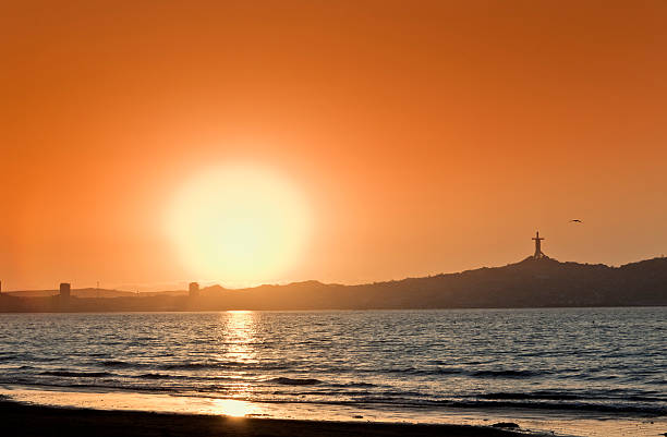 Sunset on the beach, view on Mount Maunganui from Papamoa Beach