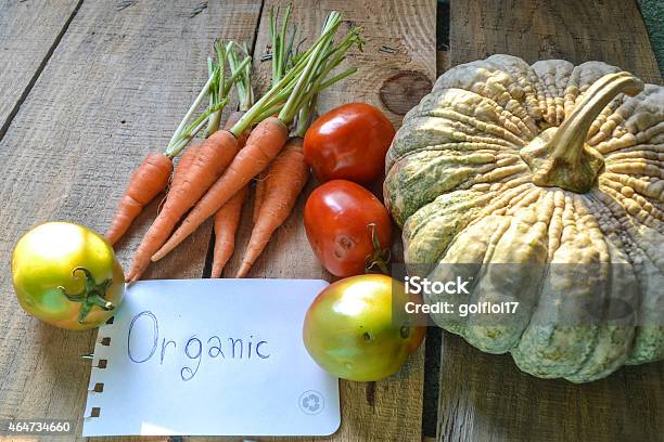 Organic Vegetables On Wooden Background Stock Photo - Download Image Now - 2015, Agriculture, Baby Carrot