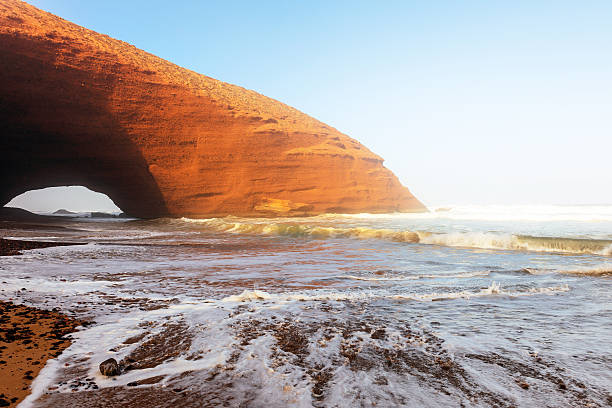 Beautiful Atlantic coast feature, Sidi Ifni, Morocco, Africa.Natural stone arch on the Atlantic beach, Legziri, Morocco, Africa.  Nikon D3x.