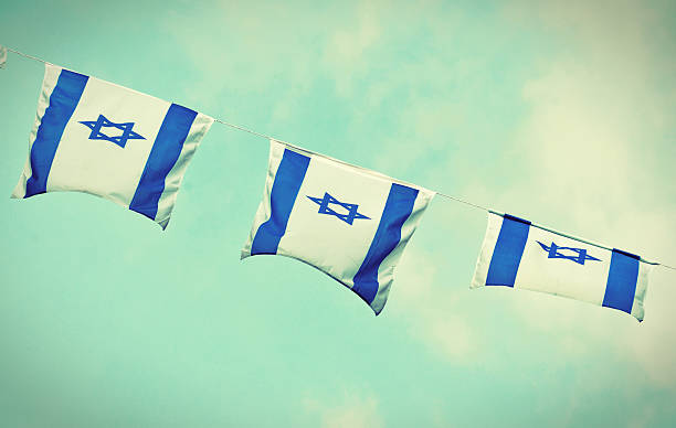 istock Israel Flag chain on Independence Day - vintage effect 464736764