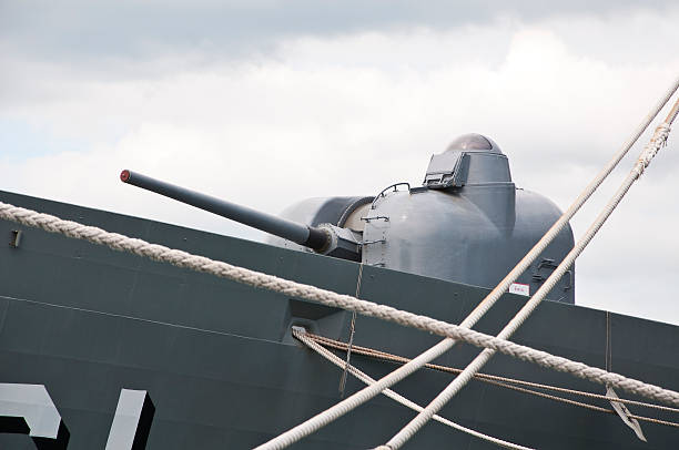 istock Close up gun of warship 464737863