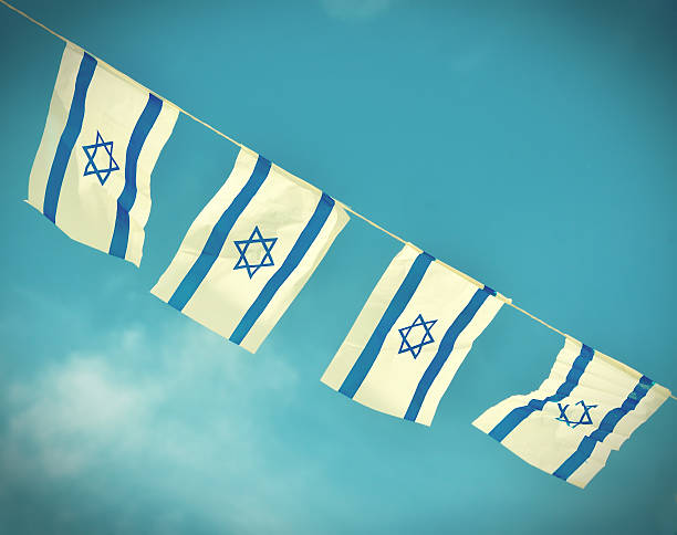 istock Israel Flag chain on Independence Day - vintage effect 464739460