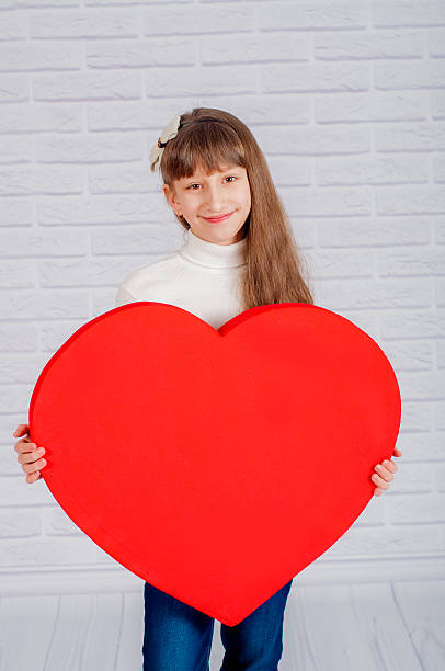 istock Little girl with a big  heart 464739810