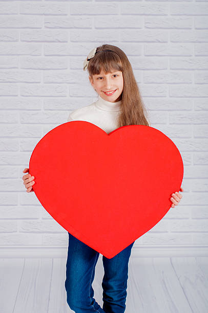istock Little girl with a big heart 464739812