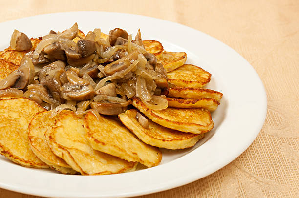 istock Potato pancakes with mushrooms 464739955