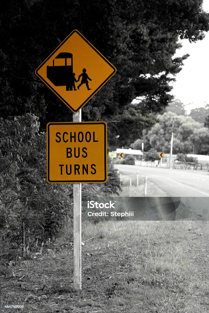 School Bus Turns Road signs in New Zealand 2015 Stock Photo
