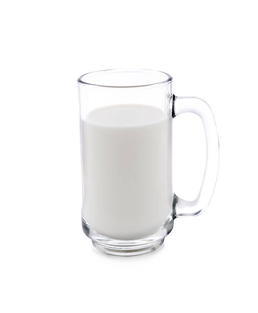 istock glass of milk on white background 464741494